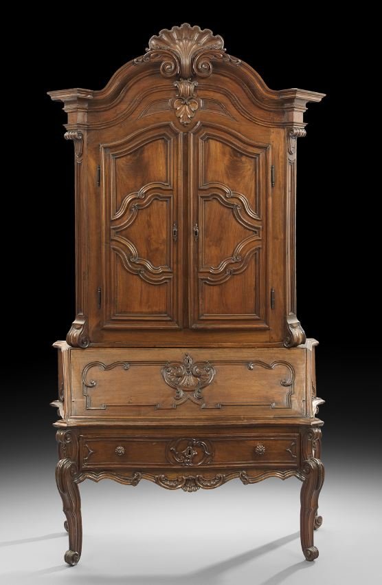 Provincial Louis XV-Style Mahogany Secretary: Provincial Louis XV-Style Fruitwood and Mahogany Secretary, late 18th/early 19th century, the heavily molded scrolling cornice centered by a carved shell, above two tri-paneled doors, the lower sectio