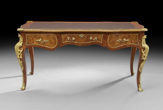 Louis XV-Style Kingwood and Burlwood Bureau Plat: Louis XV-Style Kingwood and Burlwood Bureau Plat, 20th century, the rectangular top within an ormolu banding and with an inset leather writing surface, above a frieze fitted with three drawers to one