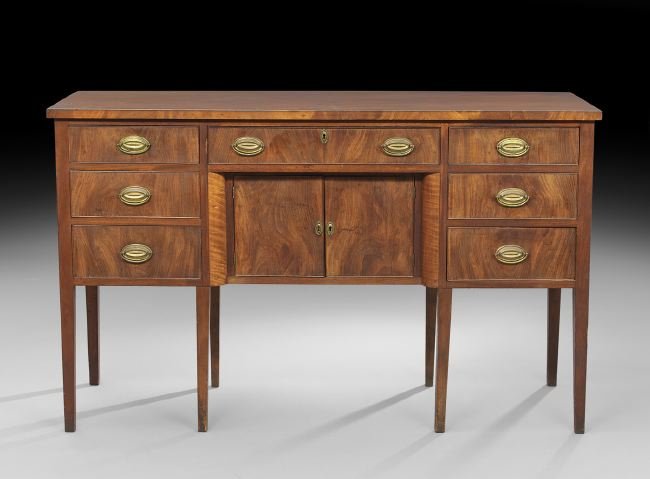 American Federal Mahogany Sideboard: American Federal Mahogany Sideboard, ca. 1800, the case with a band of three drawers over a pair of drawers, the central doors recessed, raised on tapering Hepplewhite legs, h. 41-1/4", w. 67", d. 22-