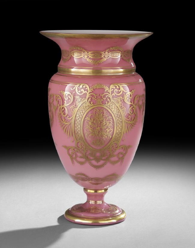 Bohemian-Style Cased Glass Garniture Vase: Bohemian-Style Gilt-Decorated Cased Glass Garniture Vase, first quarter 20th century, composed of colorless-over-pink-over-white glass and decorated with floral gilt cartouches, h. 18", dia. 10-1/2".