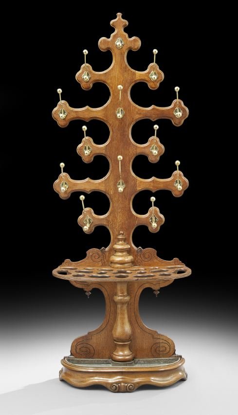 Victorian Brass-Mounted Oak Hall Tree: Victorian Brass-Mounted Oak Hall Tree, third quarter 19th century, the central shelf fitted to accommodate canes and umbrellas, h. 88", w. 33", d. 12".