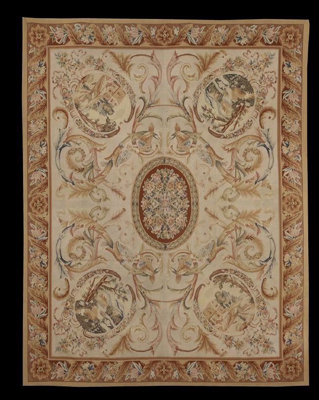 Fine Semi-Antique French Aubusson Carpet: Fine Semi-Antique French Aubusson Carpet, with corner rondels depicting French village scenes in various seasons, with a lush flower and leaf border, 8' x 10' 3".