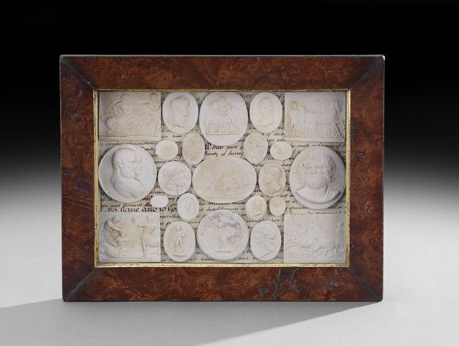Collection of Italian Grand Tour Medallions: Collection of Italian Grand Tour Medallions, third quarter 19th century, the plaster bas-relief medallions presented in a burl walnut frame with a gilt liner, h. 11-1/2", w. 15".