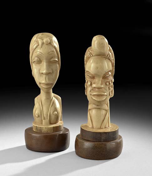 Pair of African Ivory Busts on Stands: Pair of African Ivory Busts on Stands, first half 20th century, carved as a man and a woman, h. 5", without stands.