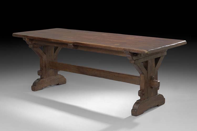 Provincial Oak Refectory Table: Provincial Oak Refectory Table, 19th century, the rectangular top raised on paneled end supports joined by a stretcher and ending in molded runner feet, h. 30", w. 33", l. 84".