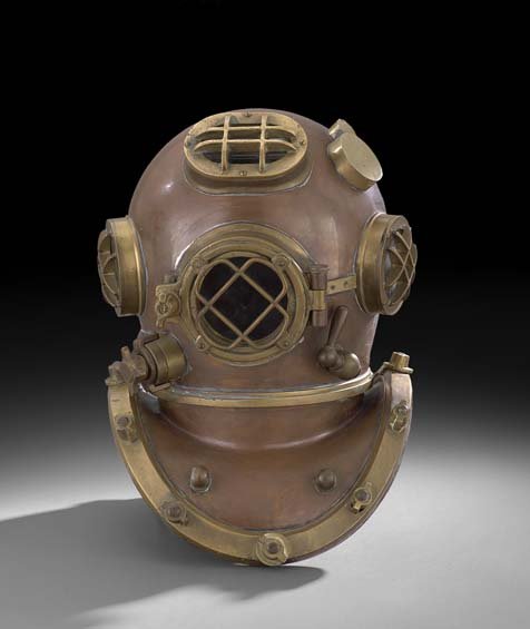 Brass-Trimmed Copper Diving Helmet: Brass-Trimmed Copper Diving Helmet, the Mark V type helmet with twelve bolts, h. 19-1/4", w. 19-1/2", d. 13-1/2".