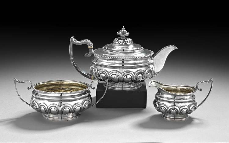 Regency Three-Piece Sterling Silver Tea Set: Regency Three-Piece Sterling Silver Tea Set, hallmarked London, June-August 1815, by Solomon Hougham (1746-1818; free 1786), including a teapot, h. 6-1/4", l. 11-3/4", an open sugar bowl, h. 3-3/8", d