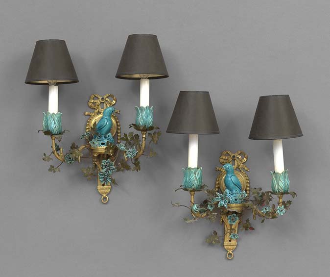 Pair of French Bronze, Porcelain and Tole Sconces: Pair of French Bronze, Porcelain and Tole Two-Light Sconces, second quarter 20th century, inspired by Henry Dasson, the bronze backplates supported by bowknots and holding turquoise porcelain parrots