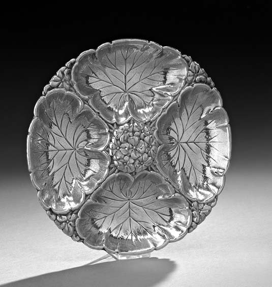 American Sterling Silver Condiment Dish: American Sterling Silver Condiment Dish, second quarter 20th century, by Wallace Silversmiths, Wallingford, Connecticut, of circular form, the all-over embossed floral decoration with four leaves form