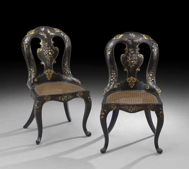 Pair of Victorian Papier-Mache Gondola Chairs: Pair of Victorian Ebonized Papier-Mache Gondola Chairs, third quarter 19th century, each with a domed back-swept back above a vasiform gilt and mother-of-pearl-decorated splat, the caned seat raised o