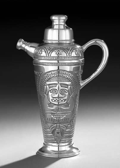 Peruvian .900 Silver Cocktail Shaker: Peruvian .900 Silver Cocktail Shaker, mid-20th century, of tapering cylindrical form with arched handle and fitted caps, decorated with chased Incan designs, h. 12-3/4", dia. 4-3/4", l. 8-1/4", 19.99 