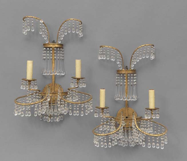 Pair of Swedish-Style Gilt-Metal Sconces: Pair of Swedish-Style Gilt-Metal Two-Light Sconces, the backplates supporting half-round prism-hung arms and upper sprays of prisms, electrified, h. 23", w. 15-1/2", d. 8-1/4".