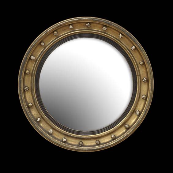 English Classical-Style Giltwood Convex Mirror: English Classical-Style Giltwood Convex Mirror, ca. 1900, the cove-molded frame set with spherules, with a reeded ebonized liner framing the mirror plate, dia. 25".