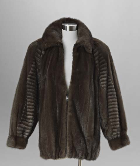 Revillon Mahogany Mink Zippered Jacket: Revillon Mahogany Mink Zippered Jacket, size 8, with convertible hook collar and zippered front closure, the raglan sleeves inset front and back with taupe and mahogany striped mink and gathered at th