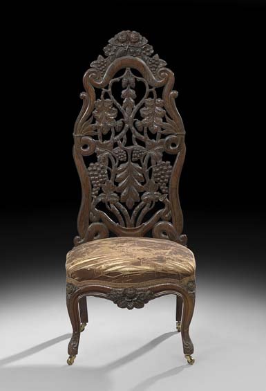 American Rococo Revival Rosewood Slipper Chair: American Rococo Revival Laminated Rosewood Slipper Chair, third quarter 19th century, attributed to John Henry Belter, New York, the pierced carved back with grapes and vines, the crest with clusters