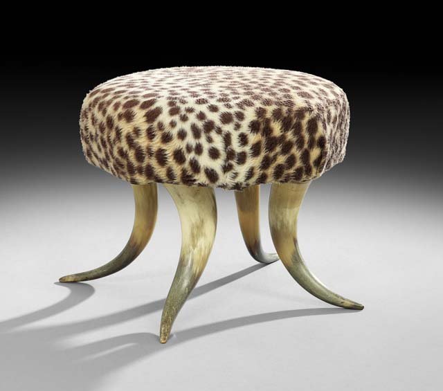 American Victorian Longhorn Legged Footstool: American Victorian Longhorn Legged Footstool, fourth quarter 19th century, the stool with four horn legs supporting the octagonal upholstered seat, h. 13-1/4", dia. 15-1/4".