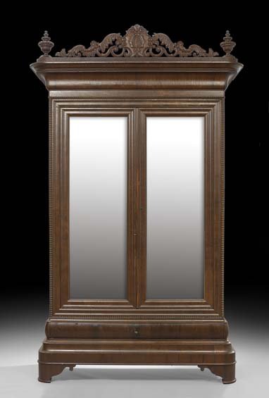 New Orleans Market Rosewood Armoire: New Orleans Market Rosewood Armoire, ca. 1850, the pierced crest centered by a cartouche amongst foliate scrools and flanked by finials, the molded cornice over a pair of mirrored doors in a cyma-mold