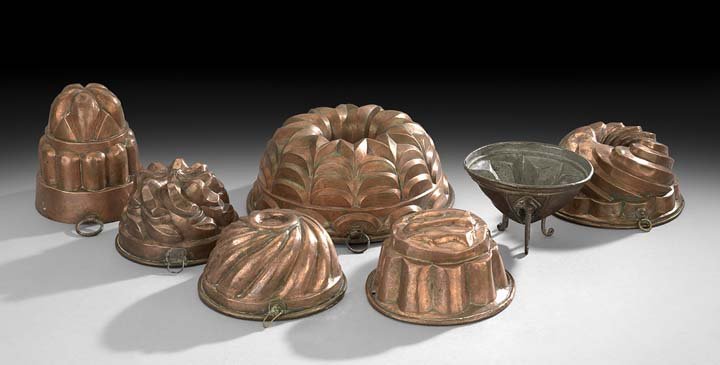 Seven English and French Copper Molds: Seven-Piece Collection of English and French Copper Molds, 18th/19th century, comprised of a French ring mold, h. 4-1/4", dia. 10-3/4"; a British ring mold, h. 6-1/4", dia. 5-3/4"; a French swirl-patt