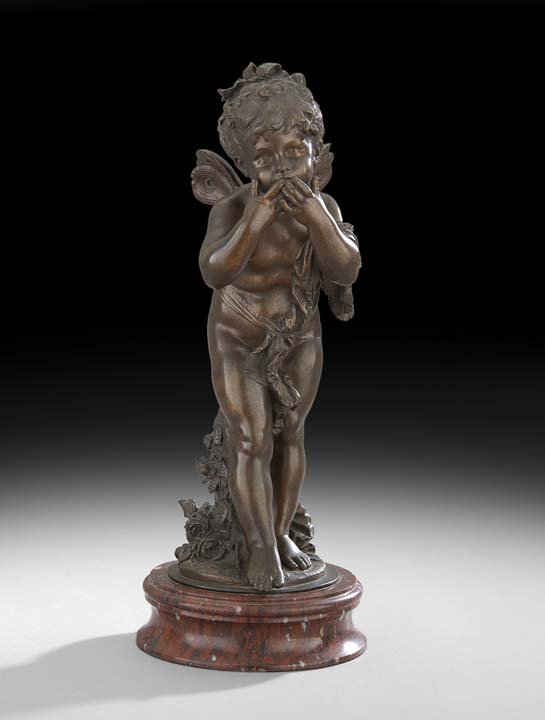 French Bronze Figure of a Winged Putto: French Bronze Figure of a Winged Putto, first quarter 20th century, in the style of Auguste Moreau (French, 1834-1917), on a rouge marble base, h. 18-1/4", w. 7", d. 6-1/2".
