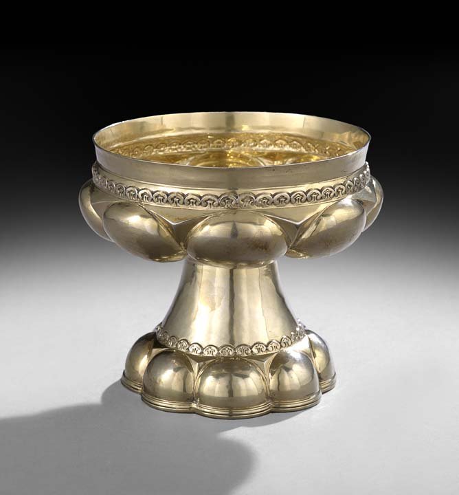 Edwardian Sterling Silver Gilt Font Cup: Edwardian Sterling Silver Gilt Font Cup, hallmarked London, 1906-1907, by Skinner & Co., with lobed bowl and trumpet foot en suite, decorated with embossed leaf-and-arch banding, h. 4-3/4", dia. 5-1/2