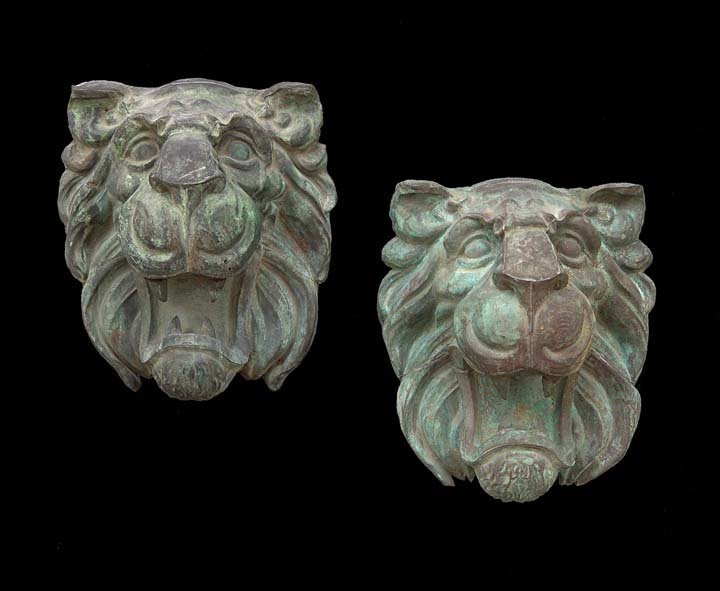 Pair of Beaux Arts Patinated Copper Lion's Heads: Pair of Beaux Arts Patinated Copper Lion's Heads, ca. 1900, possibly French, the beasts depicted roaring, retaining a rich patinated surface, h. 19-1/4", w. 15-1/4", d. 10-3/4".