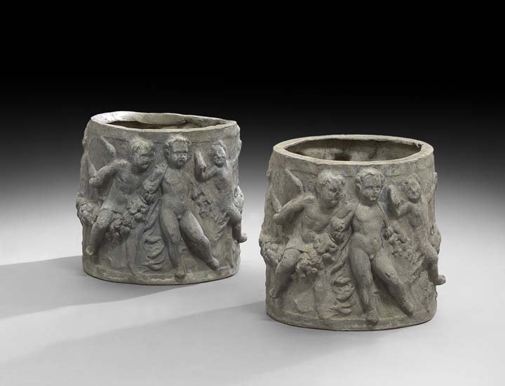 Pair of Baroque-Style Cast Lead Jardinieres: Pair of Baroque-Style Cast Lead Jardinieres, each modeled with putti frolicking around the circumference of the body, h. 12", dia. 11".
