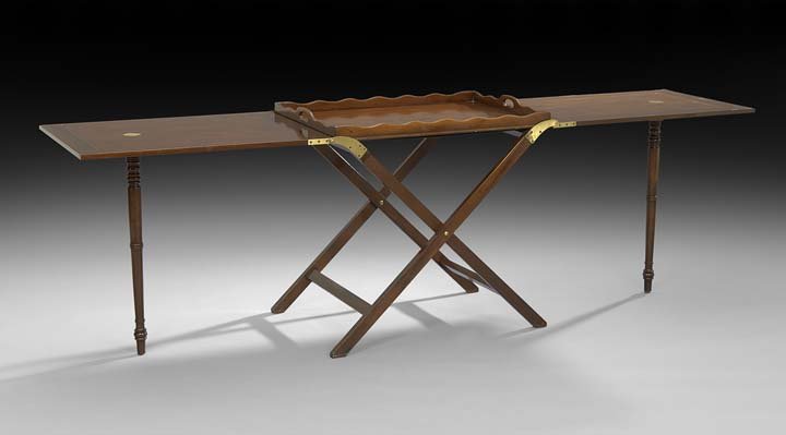Campaign-Style Mahogany Hunt Table: Campaign-Style Mahogany Hunt Table, by Baker Furniture, the rectangular tray top with a full pierced gallery, removing to fold-out leaves, each fitted for a single screw-in turned circular leg, the wh