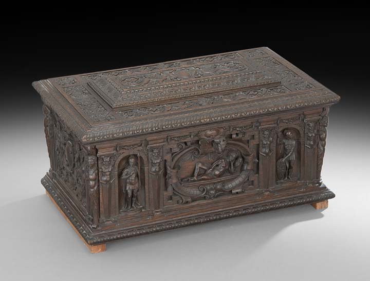 Continental Carved Walnut Coffer: Continental Carved Walnut Coffer in the Renaissance Taste, ca. 1900, the facade depicting centurions in circles, guarding Athena with her owl in the center, the cover carved with griffins and scrollwo