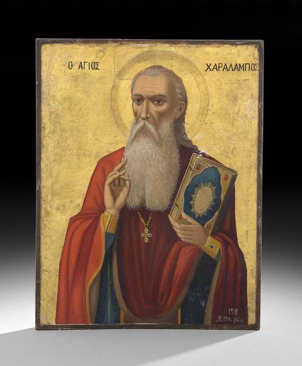 Greek Orthodox Icon of Athanasius of Alexandria: Greek Orthodox Icon of Athanasius of Alexandria, 1911, tempera and gold paint on wood panel, the bearded bishop depicted with his usual attribute of a book, one hand raised in a gesture of blessing, s