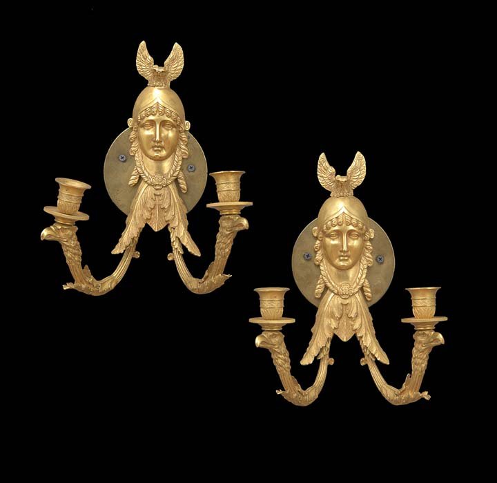 Pair of French Empire-Style Gilt-Bronze Sconces: Pair of French Empire-Style Gilt-Bronze Two-Light Sconces, the helmeted masque-form backplates with owl finials, the leaf-molded arms terminating in eagle heads supporting engine-turned drip pans moun