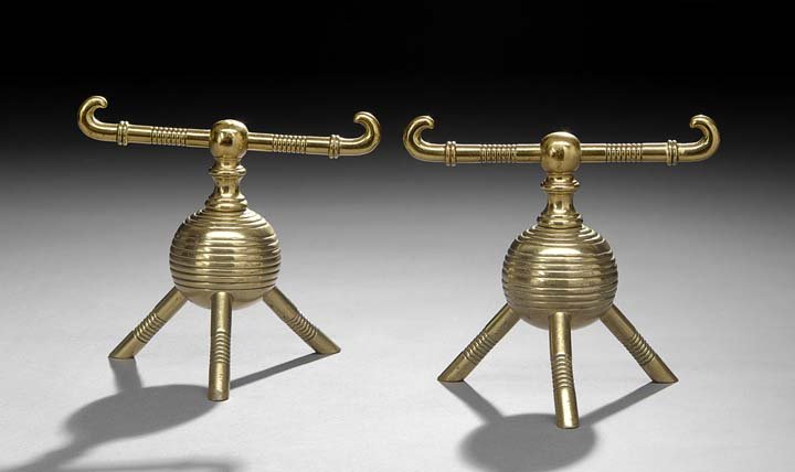 Christopher Dresser Brass Fireplace Tool Rests: Christopher Dresser Designed Brass Fireplace Tool Rests, ca. 1885, manufactured by Benham and Froud, London, each fire dog with ring-turned horizontal rest on a bulbous body with tripodal feet, h. 7-1