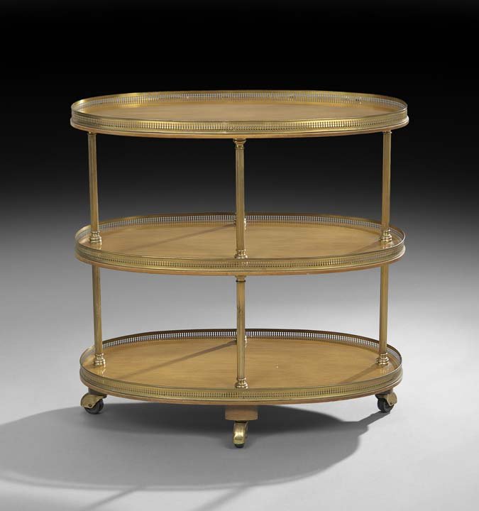 Mid-Century Mahogany and Brass Drinks Trolley: Mid-Century Mahogany and Brass Drinks Trolley, second quarter 19th century, fitted with three tiers, all with a full pierced gallery and supported by reeded tubular supports, raised on casters, h. 30-