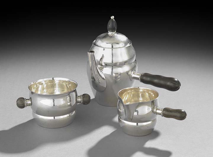 Jensen 3-Piece Sterling Demitasse Set No. 1A: George Jensen Three-Piece Sterling Silver Demitasse Set No. 1A, designed in 1905 by Georg Jensen (1866-1935), Copenhagen, with the 1925-1932 Jensen mark, including a coffeepot, h. 6", l. 7", a sugar b