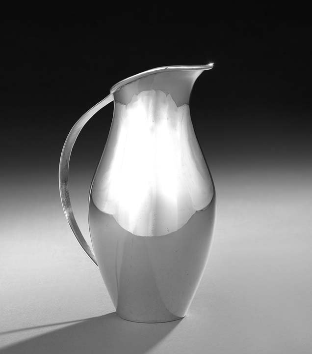 Mexican Sterling Danish Modern-Style Pitcher: Mexican Sterling Silver Danish Modern-Style Pitcher, third quarter 20th century, by Fabian, after a 1920 design by Johan Rohde (1856-1935) for Georg Jensen, with a bulbous spherical body, everted spou