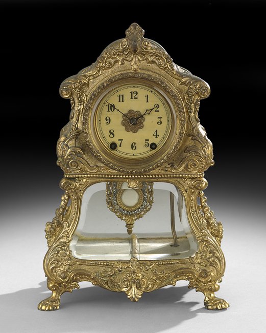 Seth Thomas Louis XV-Style Mantel Clock: Seth Thomas Gilt-Metal Louis XV-Style Mantel Clock, first quarter 20th century, Thomaston, Connecticut, h. 13-1/2", w. 8-1/2", d. 5-1/2".
