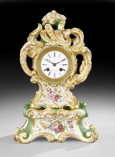 Paris Porcelain Rococo Revival Mantel Clock: Paris Porcelain Rococo Revival Mantel Clock, Attributed to Jacob Petit, mid-19th century, sitting on bold scrolled feet, the apple green ground decorated with raised gilt, floral polychrome panels dec