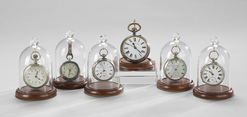 Five Watches and a Pedometer Under Domes: Six-Piece Collection of Assorted Watches and a Pedometer Under Domes, comprised of two English sterling key wind pocket watches, one retailed by H. Samuel, Manchester, ca. 1890's, a watch in a silvere