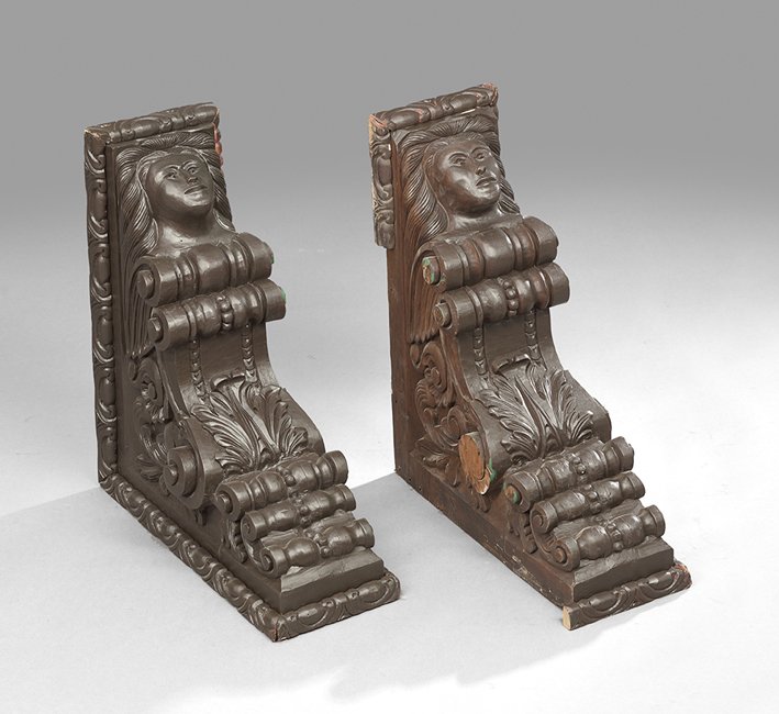 Pair of Latin American Architectural Brackets: Pair of Latin American Masque-Carved and Painted Architectural Brackets, fourth quarter 19th century, h. 23-1/2", w. 9-1/2", d. 27-1/2".