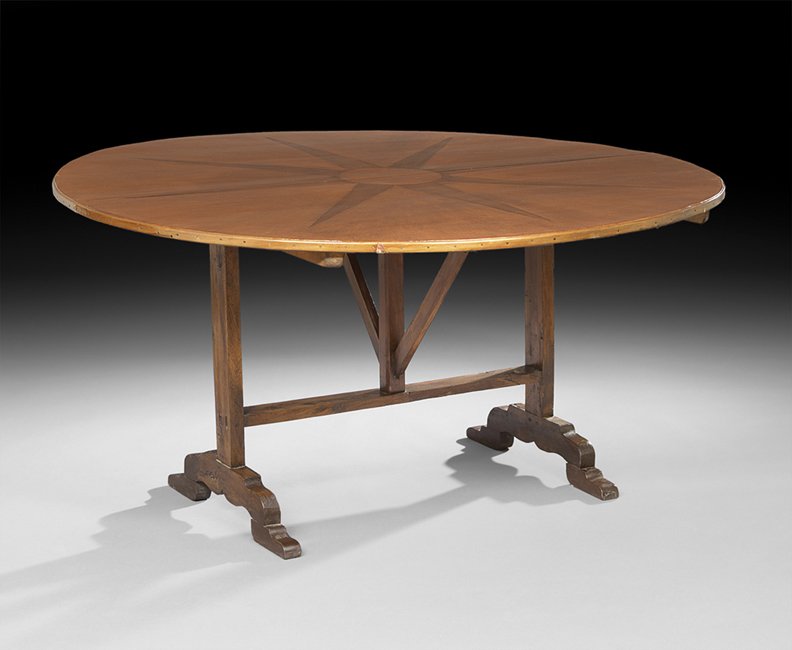 Provincial Elm and Fruitwood Wine Tasting Table: Unusual Provincial Elm and Fruitwood Wine Tasting Table, partially composed of antique elements, the tilting circular top covered in a polychrome canvas featuring a starburst inlay, raised on end and