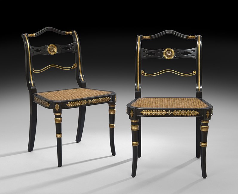 Pair of Regency-Style Parcel-Gilt Sidechairs: Pair of Regency-Style Ebonized and Parcel-Gilt Sidechairs, with caned seats, h. 35", w. 22", d. 17".