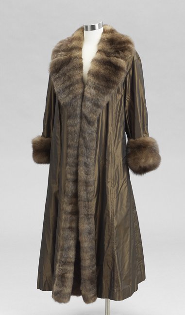Mink and Taffeta Full-Length Swing Coat: Chocolate Brown Mink and Taffeta Full-Length Swing Coat, size 6, with a broad mink notched collar and front trim, three hook closures, welt pockets and mink-trimmed set-in sleeves, the interior lined