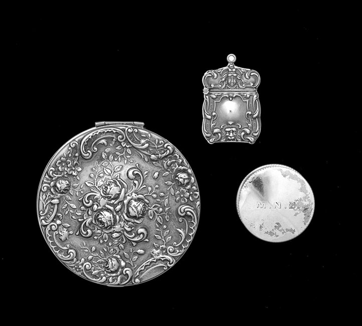 Three Pieces of Sterling Silver Smallware: Three Pieces of American and English Sterling Silver Smallware, first half 20th century, including a Gorham circular compact, dia. 3", an unmarked rectangular stamp box, l. 1-1/2", and an Edwardian ci