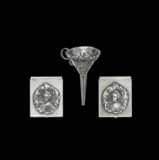 Three Pieces of Sterling Silver Smallware: Three Pieces of Sterling Silver Smallware, first half 20th century, including a pair of American Frank May Art Nouveau stamp boxes, l. 1-1/4", and a Mexican perfume funnel, l. 2", 0.80 total t. oz.