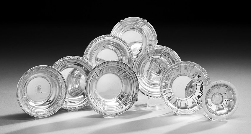 Eight Sterling Silver Bonbon Dishes: Eight Sterling Silver Bonbon Dishes, first half 20th century, including a British colonial example set with an Edwardian 1908 Straits Settlement dollar coin, a Wallace "Betsy Ross" example, a mid-cent