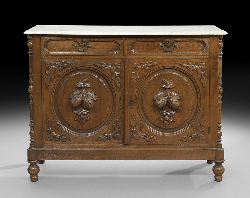 American Rococo Revival Oak Sideboard: American Rococo Revival Oak Sideboard, third quarter 19th century, the period marble top on a case with a pair of drawers over a pair of doors with fruit- and foliate-carved panels, h. 42-1/2", w. 53-