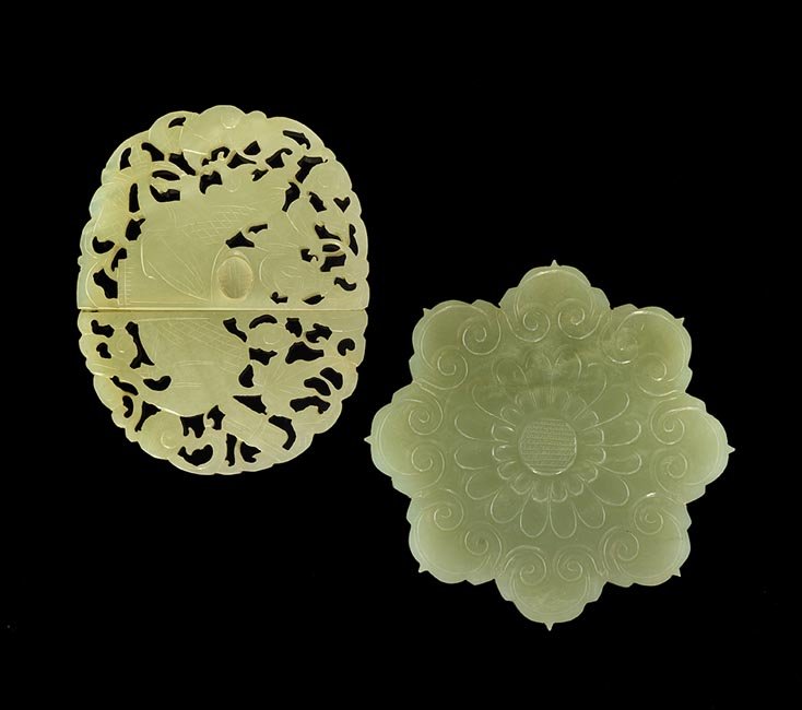 Two Chinese Jade Carvings: Two Chinese Jade Carvings, 19th century, including an eight-petal flower and a two-piece pierced belt clasp, dia. 3".
