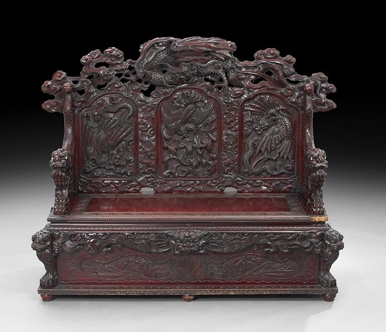 Japanese Carved Hall Seat: Japanese Carved Hall Seat, Meiji Period (1868-1912), ornately carved and pierced with sea dragons and waves, h. 49", w. 65", d. 25".