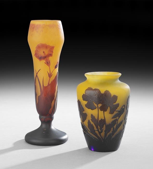 Two French Cameo Glass Vases: Two French Cameo Glass Vases, first quarter 20th century, comprising a bud vase, signed "Daum Nancy", decorated with russet flowers and leaves cut to an orange ground, h. 8", dia. 2-3/4", and a signed
