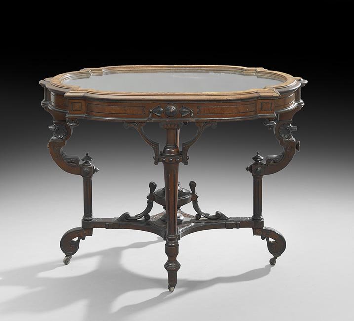American Neo-Grec Walnut Center Table: American Neo-Grec Burled Walnut and Walnut Center Table, third quarter 19th century, the top now fitted with a mirror plate inset in a burled frame, the conforming apron with burled panels and raised 