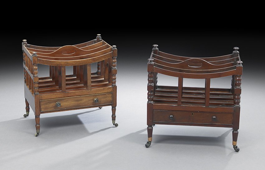 Two Regency-Style Mahogany Canterburies: Two Regency-Style Mahogany Canterburies, late 19th century, each fitted with four slotted compartments over a single long drawer, raised on tapering circular legs ending in brass caps and casters, h.